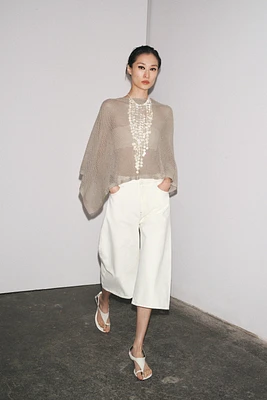 METALLIC THREAD CUT-OUT KNIT CAPE