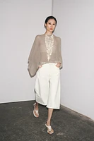 METALLIC THREAD CUT-OUT KNIT CAPE