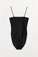 FITTED STRAPPY BODYSUIT WITH SEAMS