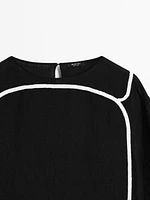 Blouse with contrast embroidery
