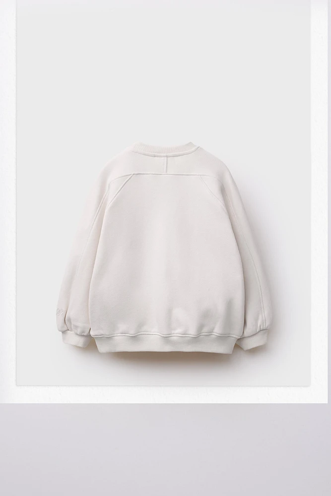 PLAIN CUT-OUT SWEATSHIRT