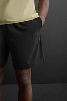 LIGHTWEIGHT PERFORATED SHORTS