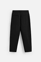 FLOWY PLEATED PANTS