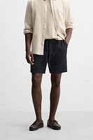 TEXTURED REGULAR FIT BERMUDA SHORTS