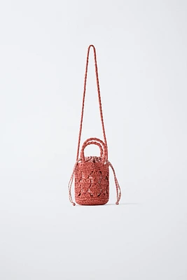 HEARTS RAFFIA BUCKET BAG