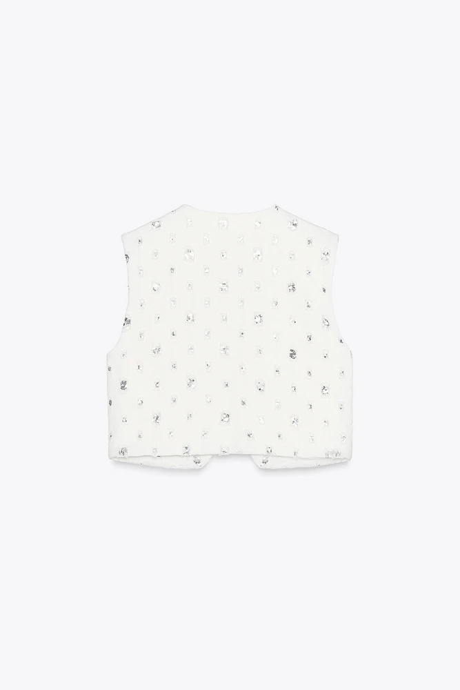 GILET COURT À SEQUINS