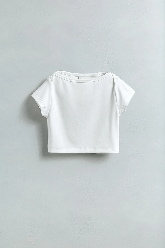 TOP CROPPED UNI ÉLASTIQUE