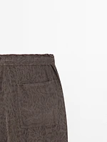 Flowing wide-leg jacquard trousers