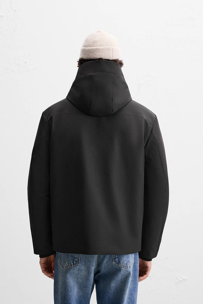 HOODED TECHNICAL JACKET