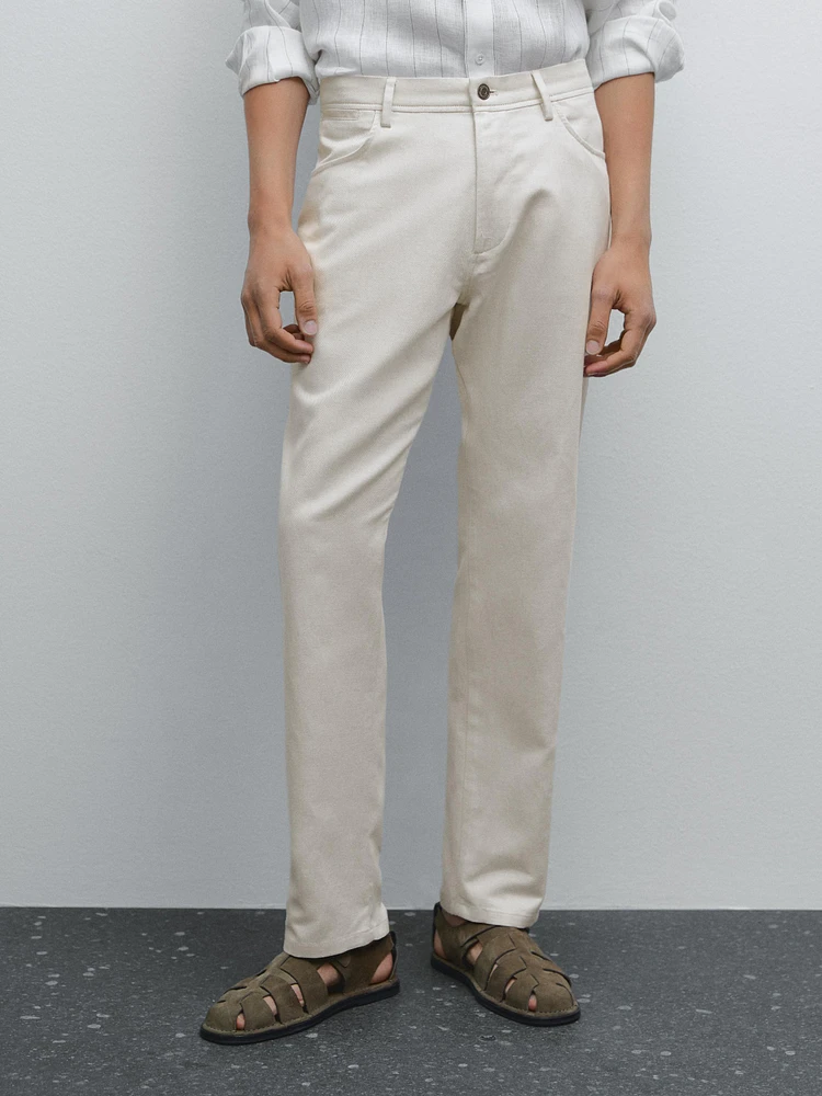 Cotton blend tapered fit denim trousers