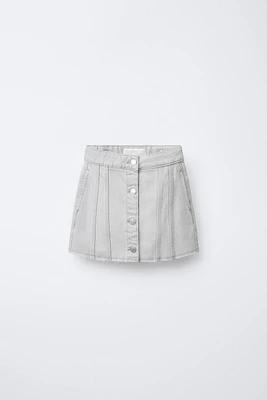 JUPE EN DENIM À COUPES EFFILOCHÉES