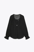 BLOUSE SEMI-TRANSPARENTE