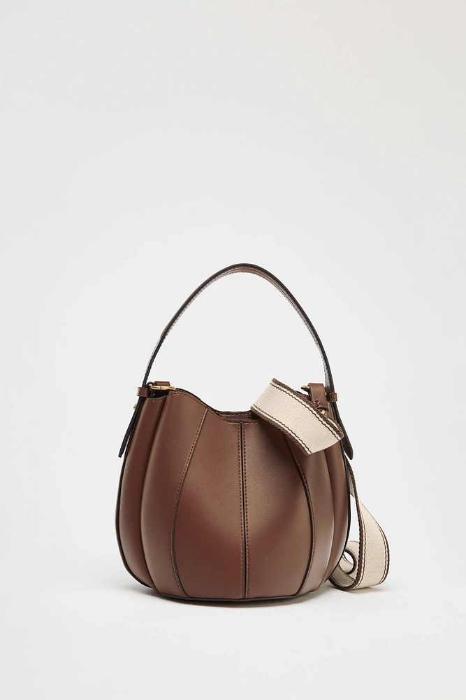 TOPSTITCHED BUCKET BAG
