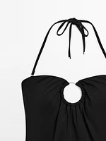 Bandeau swimsuit with metal piece detail