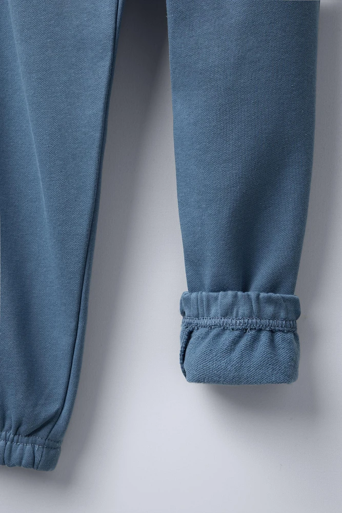 PANTALON DE JOGGING AVEC INSCRIPTION BRODÉE