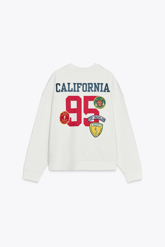 SWEATSHIRT WITH PATCHES