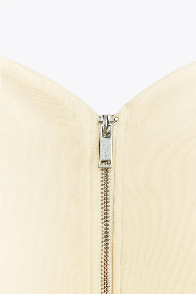 TOP INTERLOCK ZIP