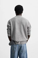 100% WOOL FLECKED SWEATER