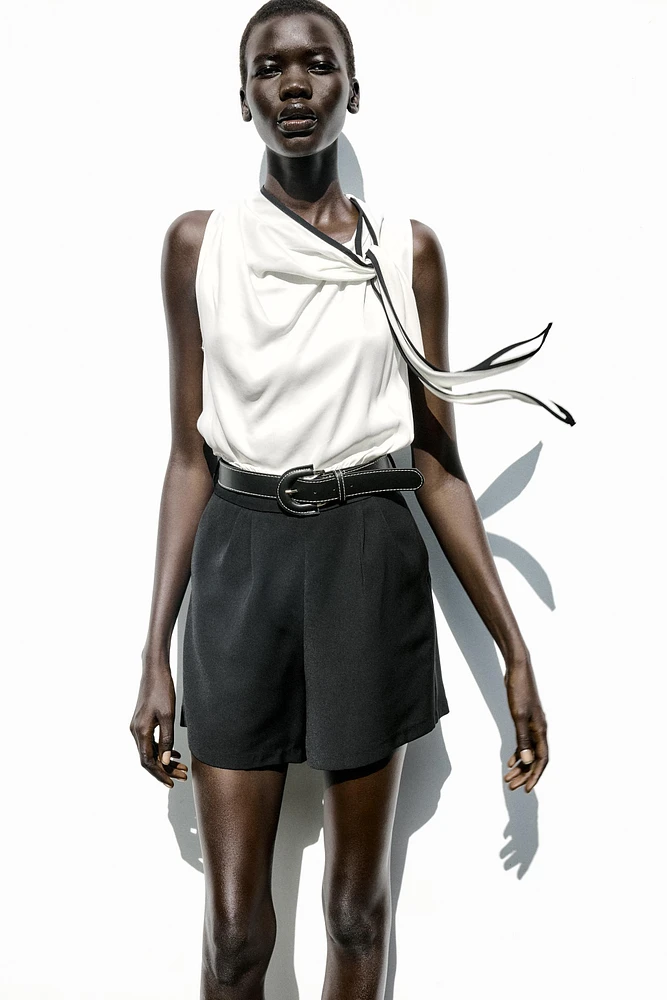 BELTED COMBINATION SHORT JUMPSUIT