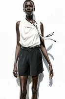 BELTED COMBINATION SHORT JUMPSUIT