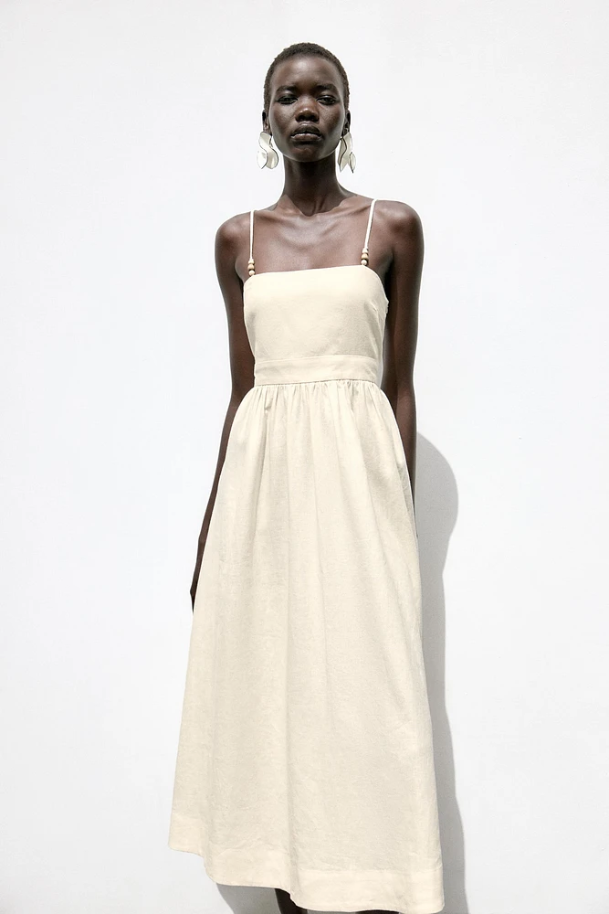 ROBE MIDI AVEC LIN BRETELLES FANTAISIE