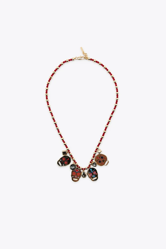 2-PACK OF ENAMELED SKULL NECKLACES