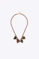 2-PACK OF ENAMELED SKULL NECKLACES