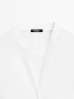 Flowing linen shirt with stand collar