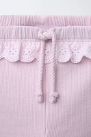 SWISS EMBROIDERED RUFFLE RIBBED LEGGINGS
