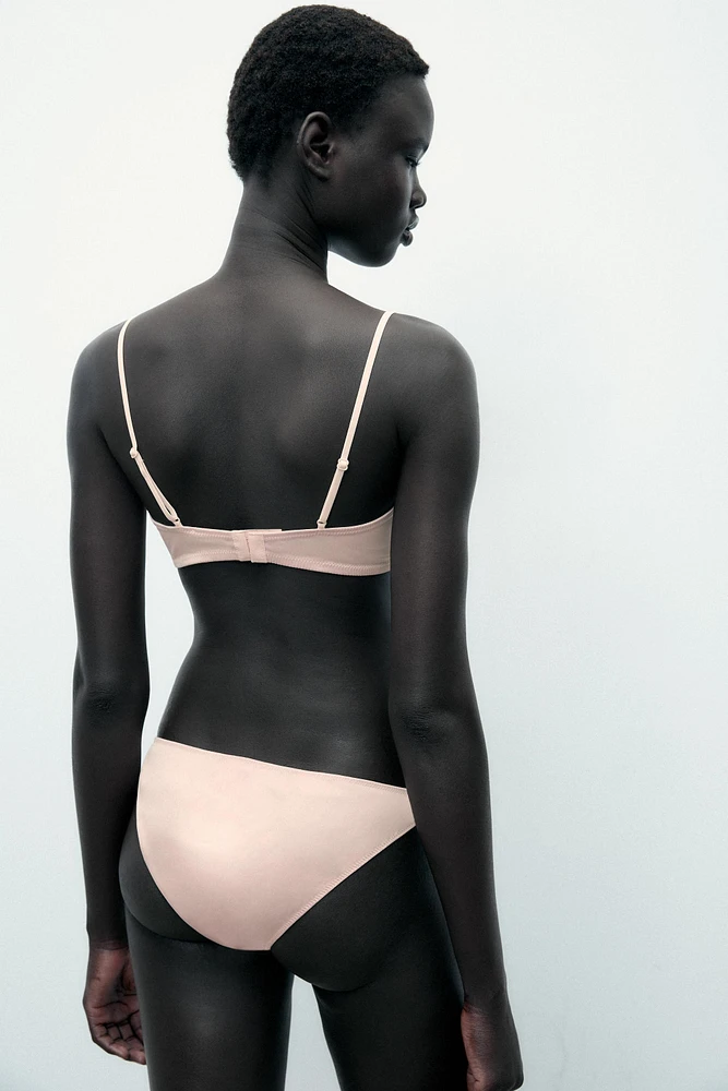 CULOTTE EN MATIÈRES VARIÉES BRODÉES