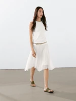 Pleated skirt with godet detail