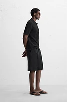 REGULAR FIT TEXTURED POLO SHIRT