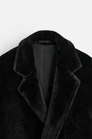 MANTEAU EN FAUSSE FOURRURE