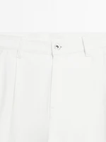 Relaxed fit mid-rise trousers