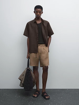 100% linen semi-jogger fit Bermuda shorts
