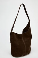 ASYMMETRIC SOFT SUEDE BUCKET BAG