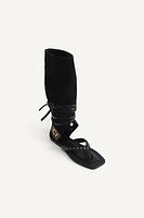 SANDALES HAUTES EN CUIR ÉDITION LIMITÉE