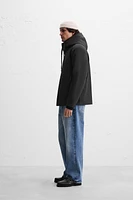 HOODED TECHNICAL JACKET