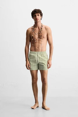 MAILLOT DE BAIN MI-LONG À MOTIFS ONDULÉS