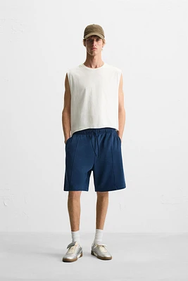 BERMUDA DE JOGGING COUTURES