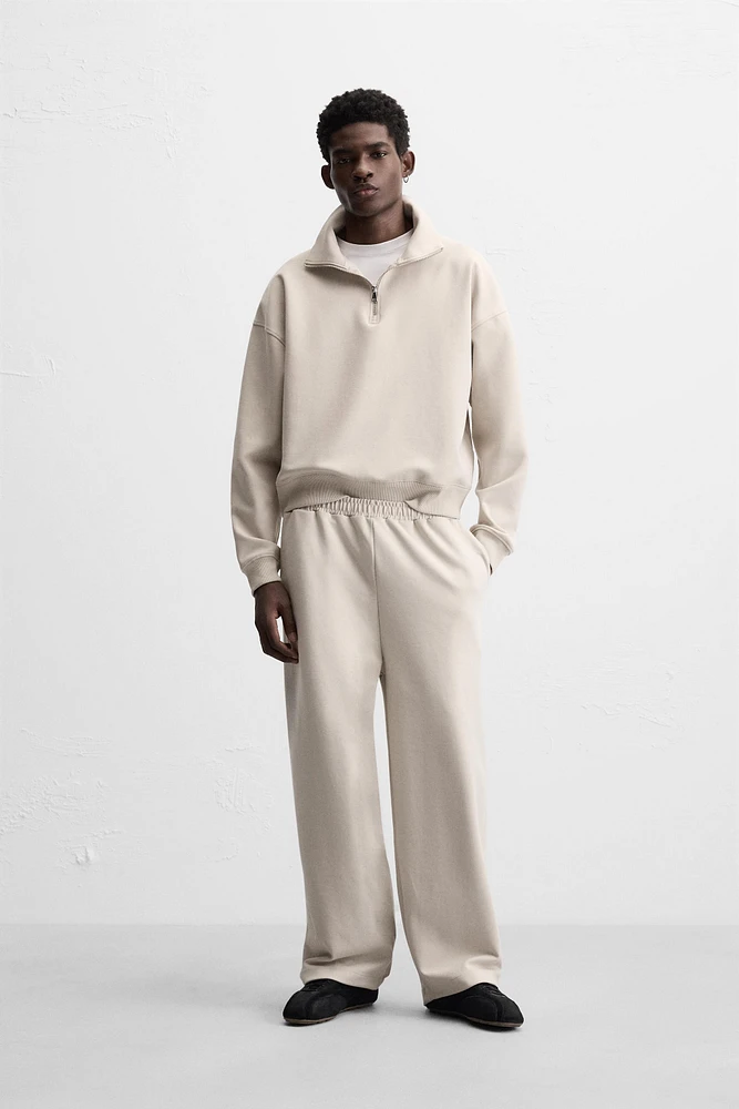 QUARTER ZIP TECHNICAL SWEATSHIRT