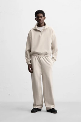 QUARTER ZIP TECHNICAL SWEATSHIRT