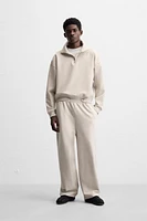 QUARTER ZIP TECHNICAL SWEATSHIRT