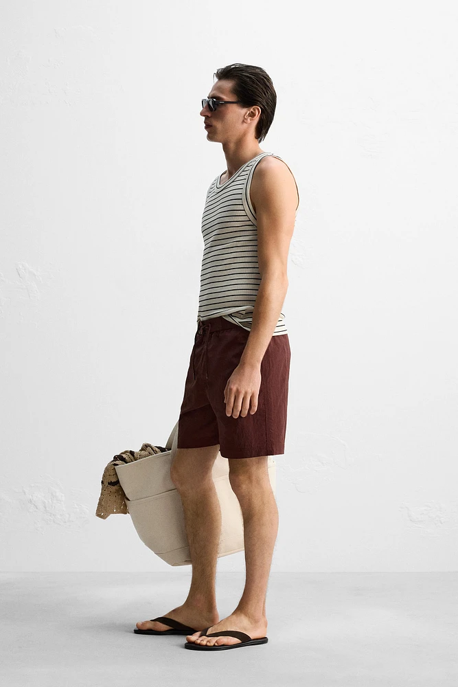 DRAWSTRING SWIM TRUNKS