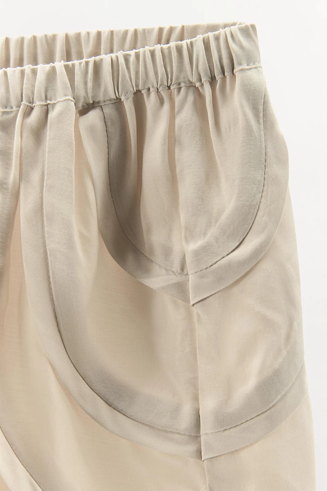PLEATED LACE SHORTS