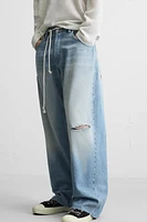 RIPPED BAGGY FIT JEANS