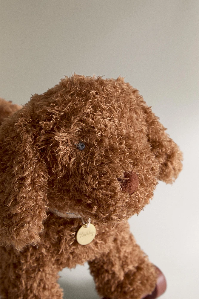 CHILDREN'S PLUSH TOY DOG WITH WHEELS