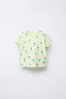 T-SHIRT IMPRIMÉ PALMIERS