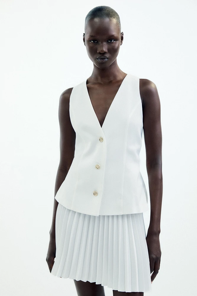 ROBE COURTE EN MATIÈRES VARIÉES