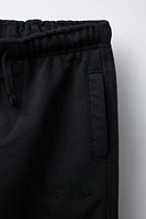 EMBROIDERED TEXT JOGGER PANTS